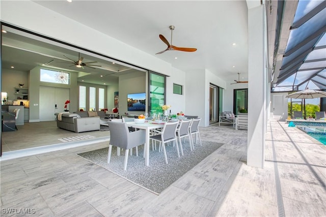 dining room with ceiling fan and recessed lighting