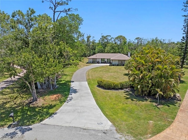 3795 Liberty Sq, Fort Myers, FL 33908 - view of front of property with driveway and a front yard