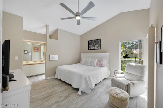 14871 Crescent Cove Dr, Fort Myers, FL 33908 - bedroom featuring a ceiling fan, light wood-type flooring, a sink, high vaulted ceiling, and connected bathroom