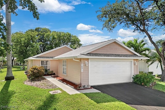 14871 Crescent Cove Dr, Fort Myers, FL 33908 - ranch-style home featuring roof with shingles, driveway, a front yard, and a garage