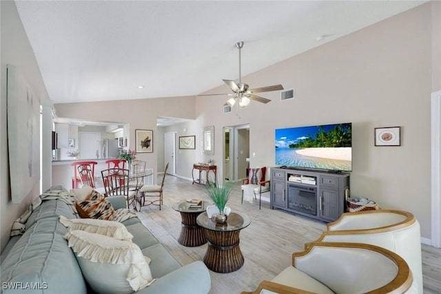 14871 Crescent Cove Dr, Fort Myers, FL 33908 - living room featuring baseboards, ceiling fan, light wood finished floors, and visible vents