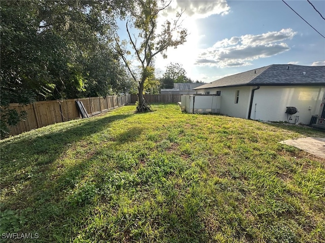 view of yard featuring a fenced backyard