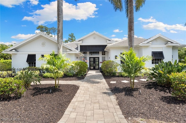 view of front facade featuring french doors