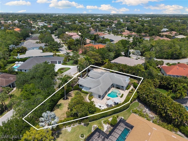 aerial perspective of suburban area featuring property boundaries highlighted and a pool area