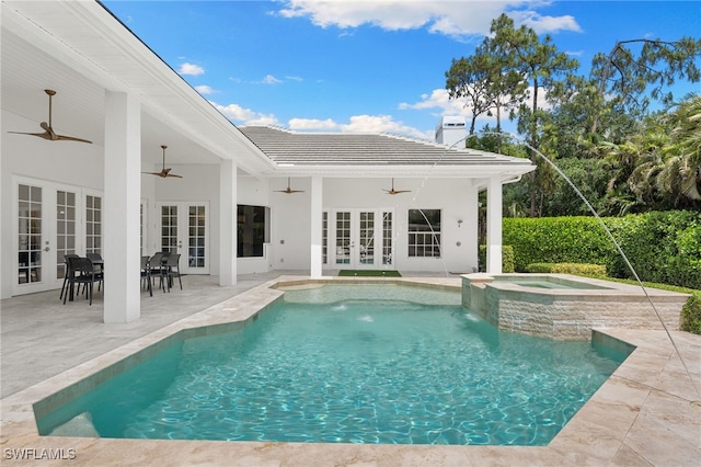 view of swimming pool featuring french doors, a ceiling fan, and a patio