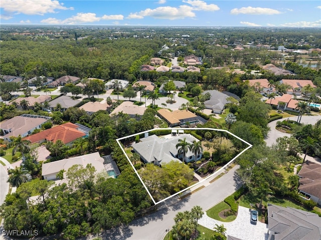 aerial perspective of suburban area featuring property boundaries highlighted