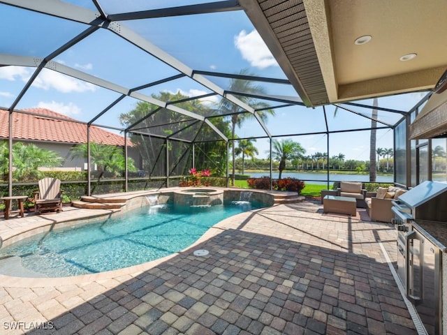 view of pool with a patio, a water view, outdoor lounge area, glass enclosure, and a pool with connected hot tub