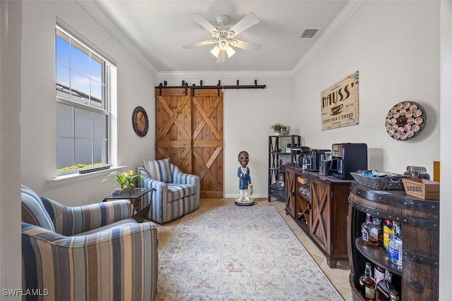 20005 Parrot Key Ct, Estero, FL 33928 - sitting room featuring a barn door, a ceiling fan, crown molding, and light tile patterned floors