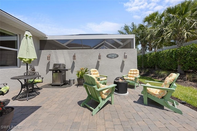 20005 Parrot Key Ct, Estero, FL 33928 - view of patio / terrace with grilling area and an outdoor fire pit
