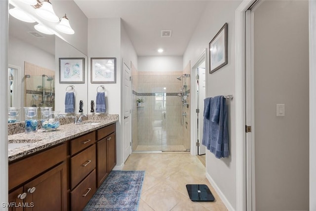 20005 Parrot Key Ct, Estero, FL 33928 - bathroom featuring a shower stall, tile patterned flooring, double vanity, visible vents, and a sink