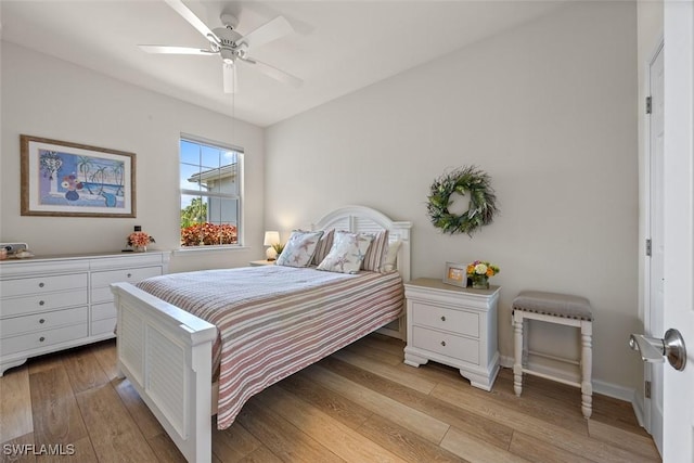 20005 Parrot Key Ct, Estero, FL 33928 - bedroom featuring light wood-type flooring, baseboards, and ceiling fan