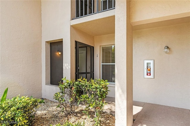 5731 Foxlake Dr Unit 1, North Fort Myers, FL 33917 - property entrance featuring stucco siding