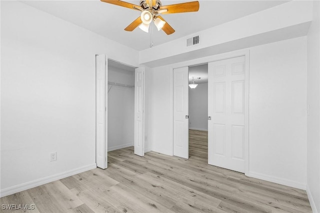 5731 Foxlake Dr Unit 1, North Fort Myers, FL 33917 - unfurnished bedroom featuring baseboards, visible vents, and light wood-style flooring