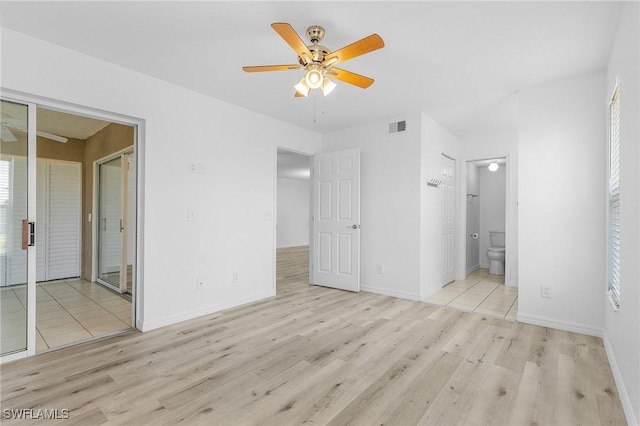 5731 Foxlake Dr Unit 1, North Fort Myers, FL 33917 - unfurnished bedroom featuring baseboards, visible vents, and wood finished floors
