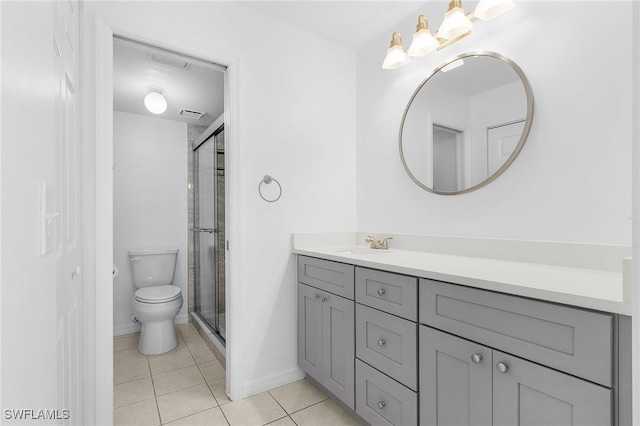 5731 Foxlake Dr Unit 1, North Fort Myers, FL 33917 - bathroom with toilet, a stall shower, tile patterned flooring, and vanity