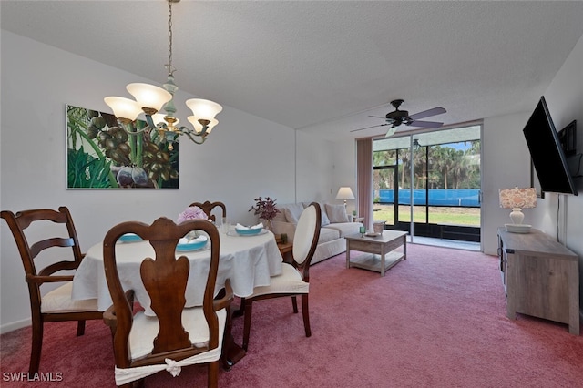 dining space featuring a textured ceiling, carpet flooring, and ceiling fan with notable chandelier