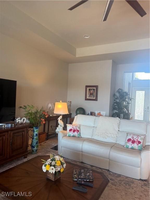 living area featuring ceiling fan