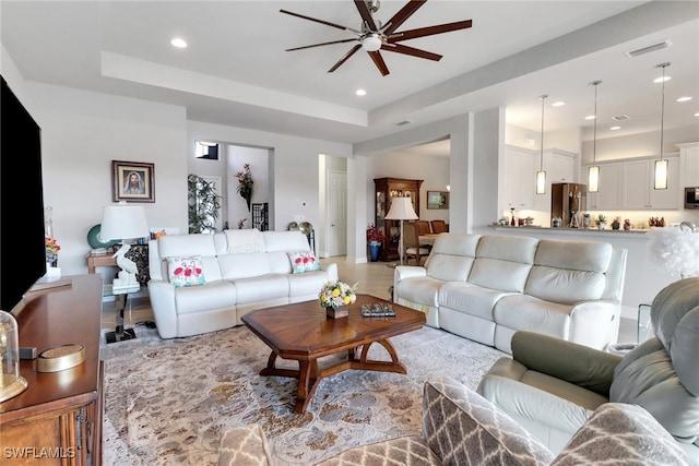 11692 Stonecreek Cir, Fort Myers, FL 33913 - living area with a ceiling fan, recessed lighting, and a raised ceiling