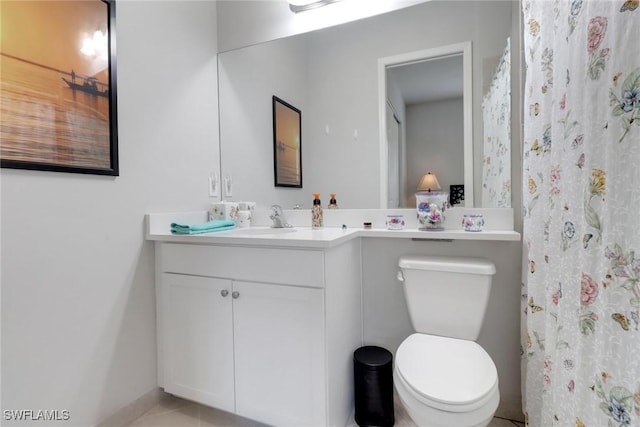 11692 Stonecreek Cir, Fort Myers, FL 33913 - bathroom with vanity, toilet, tile patterned flooring, a shower with shower curtain, and baseboards