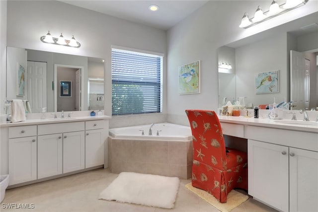 11692 Stonecreek Cir, Fort Myers, FL 33913 - full bath featuring tile patterned floors, a garden tub, two vanities, and recessed lighting