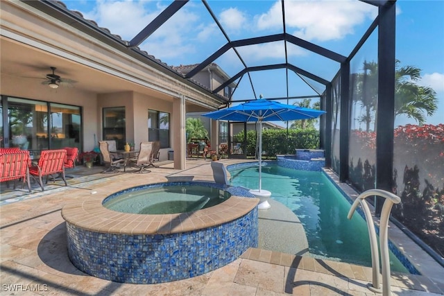 11692 Stonecreek Cir, Fort Myers, FL 33913 - view of pool featuring a patio, a ceiling fan, a pool with connected hot tub, a lanai, and outdoor dining area