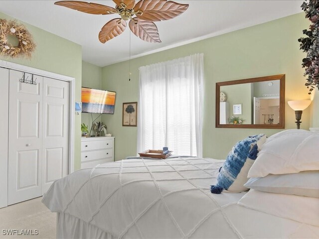 363 Pindo Palm Dr, Naples, FL 34104 - bedroom with a closet and a ceiling fan