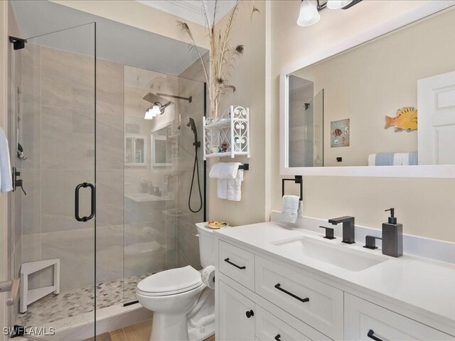 363 Pindo Palm Dr, Naples, FL 34104 - full bath with toilet, vanity, and a shower stall