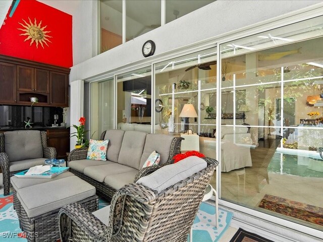 363 Pindo Palm Dr, Naples, FL 34104 - sunroom / solarium with outdoor lounge area