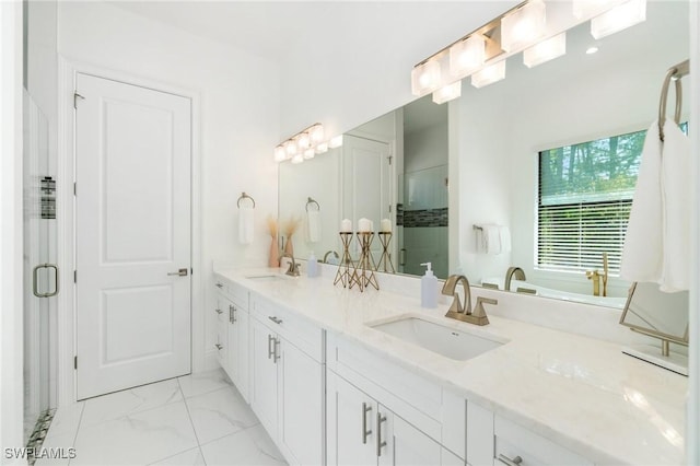10191 Strike Ln, Bonita Springs, FL 34135 - bathroom with double vanity, a sink, and a stall shower