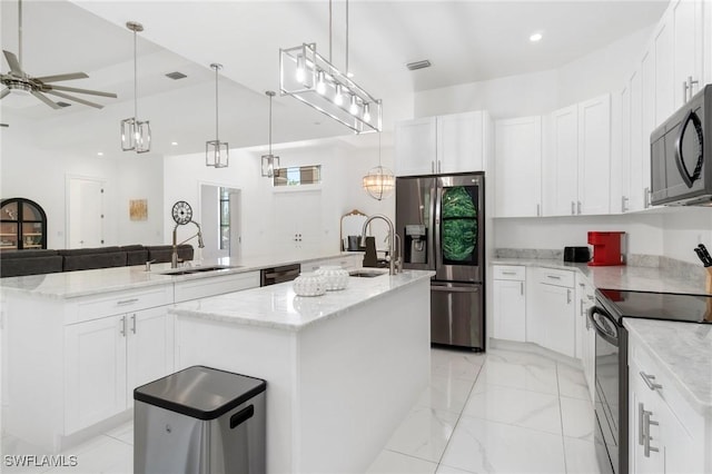 10191 Strike Ln, Bonita Springs, FL 34135 - kitchen featuring a sink, ceiling fan, a kitchen island with sink, and black appliances