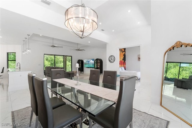 10191 Strike Ln, Bonita Springs, FL 34135 - dining room with recessed lighting, marble finish floor, and ceiling fan with notable chandelier