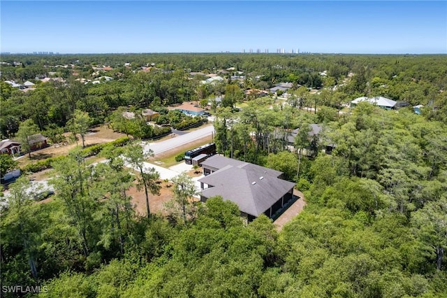 10191 Strike Ln, Bonita Springs, FL 34135 - bird's eye view featuring a view of trees