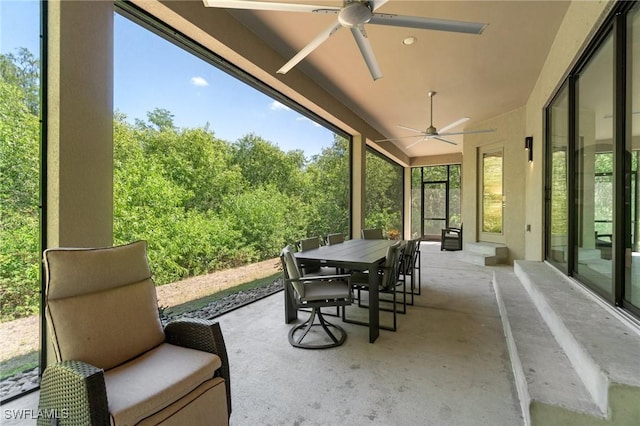10191 Strike Ln, Bonita Springs, FL 34135 - sunroom / solarium with ceiling fan and outdoor dining space