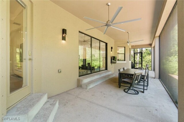 10191 Strike Ln, Bonita Springs, FL 34135 - sunroom featuring ceiling fan