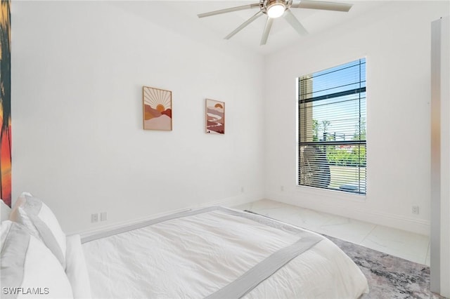 10191 Strike Ln, Bonita Springs, FL 34135 - unfurnished bedroom with a ceiling fan, baseboards, and marble finish floor