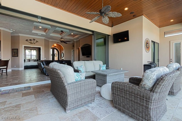 view of patio featuring an outdoor living space and a ceiling fan