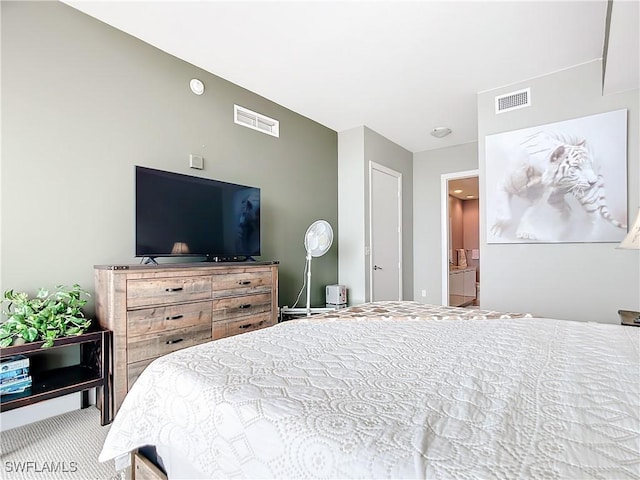 3000 Oasis Grand Blvd, Fort Myers, FL 33916 - bedroom with visible vents and connected bathroom
