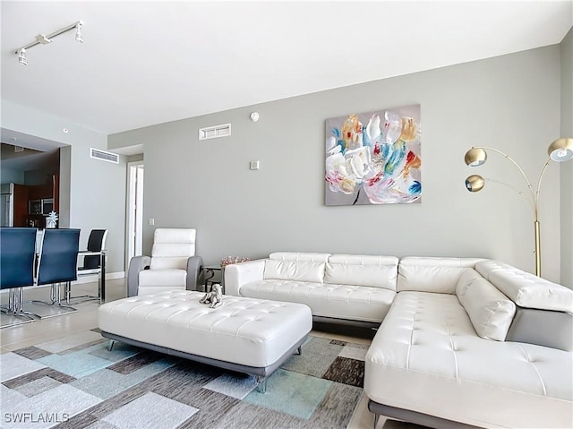 3000 Oasis Grand Blvd, Fort Myers, FL 33916 - living room with visible vents and baseboards
