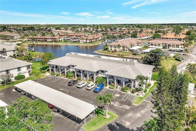 aerial view of residential area with a nearby body of water