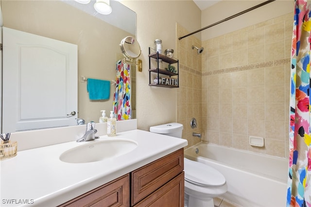 bathroom with toilet, shower / bath combo, and vanity