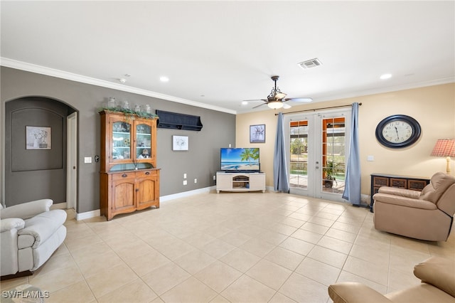 living room with french doors, recessed lighting, crown molding, and light tile patterned flooring