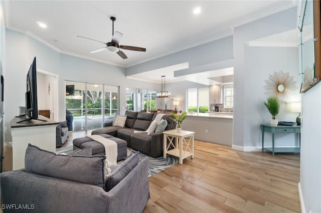 2733 Island Pond Ln, Naples, FL 34119 - living area with ceiling fan, light wood-type flooring, ornamental molding, recessed lighting, and baseboards