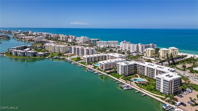 view of urban area featuring a large body of water