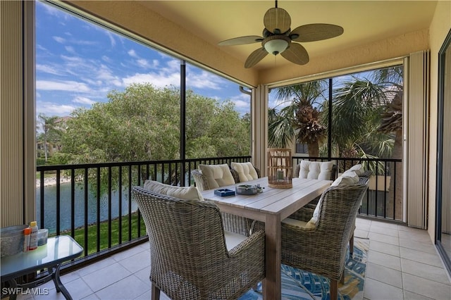 184 Vintage Cir Unit N202, Naples, FL 34119 - sunroom / solarium with outdoor dining space, ceiling fan, and a water view