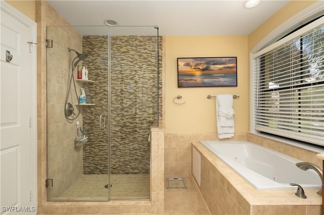 184 Vintage Cir Unit N202, Naples, FL 34119 - full bathroom featuring a whirlpool tub and a stall shower