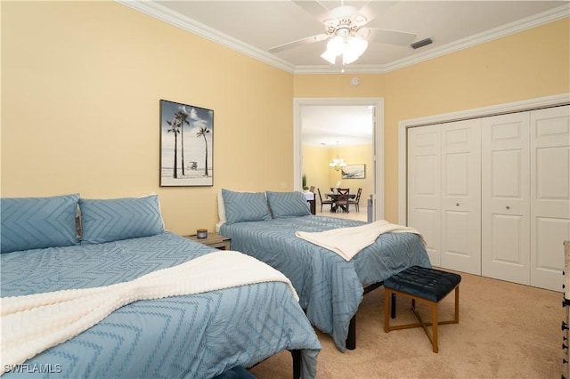184 Vintage Cir Unit N202, Naples, FL 34119 - bedroom featuring light colored carpet, a closet, ornamental molding, visible vents, and a ceiling fan
