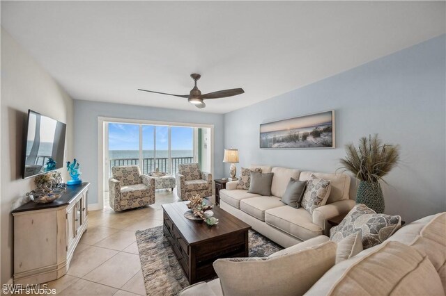 26000 Hickory Blvd Unit 604, Bonita Springs, FL 34134 - living area featuring light tile patterned floors and ceiling fan