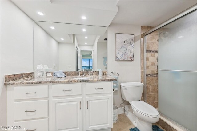 26000 Hickory Blvd Unit 604, Bonita Springs, FL 34134 - full bath with recessed lighting, toilet, vanity, and a stall shower
