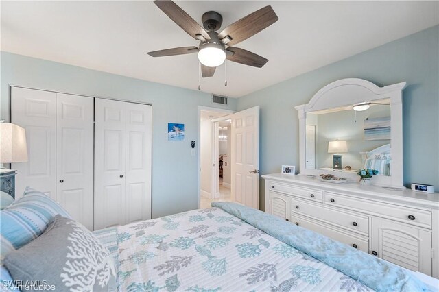 26000 Hickory Blvd Unit 604, Bonita Springs, FL 34134 - bedroom with a closet, visible vents, and ceiling fan