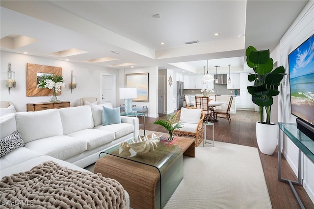 4830 W Blvd, Naples, FL 34103 - living area with dark wood-style flooring and recessed lighting